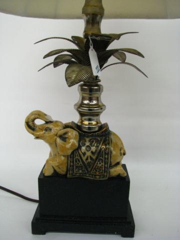 Appraisal: Elephant motif wooden electric lamp with metal palm leaves tall