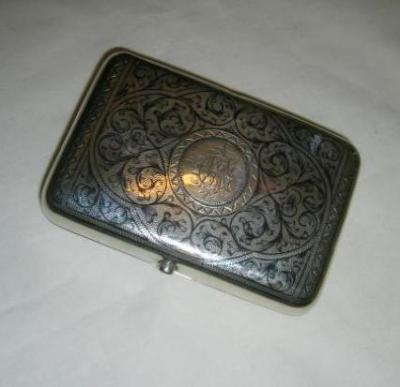 Appraisal: A RUSSIAN NIELLO CIGARETTE CASE of rounded oblong form chased