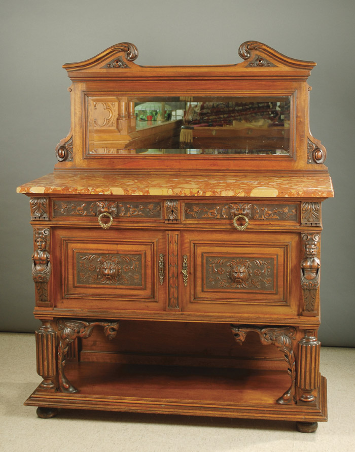 Appraisal: CARVED OAK SIDEBOARD Continental th century having a mirror backsplash