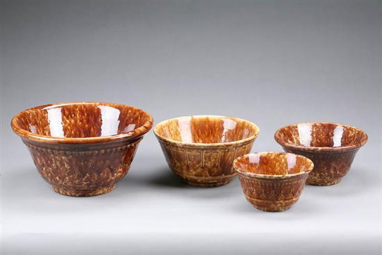 Appraisal: FOUR ROCKINGHAM BOWLS One waste and three mixing bowls all