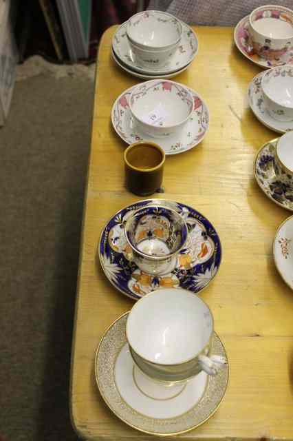 Appraisal: A NEW HALL PORCELAIN CUP and saucer with blue acorn