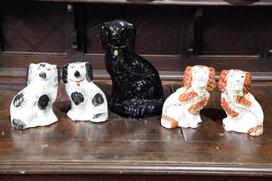 Appraisal: FIVE CERAMIC SPANIELS Two pair of Staffordshire one with baskets