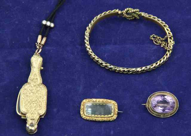 Appraisal: A gold cased French lorgnette with engraved case on a