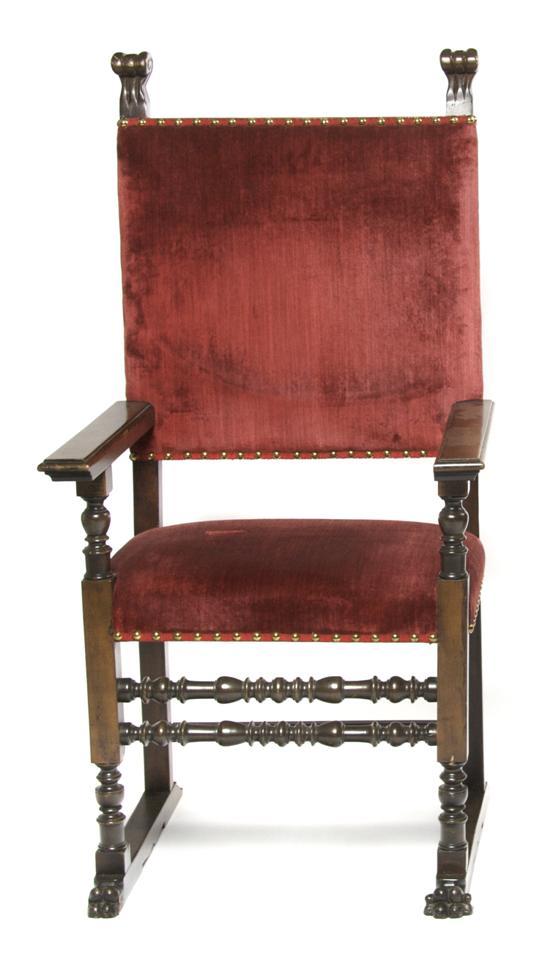 Appraisal: Renaissance Revival Mahogany Armchair th century the red velvet back