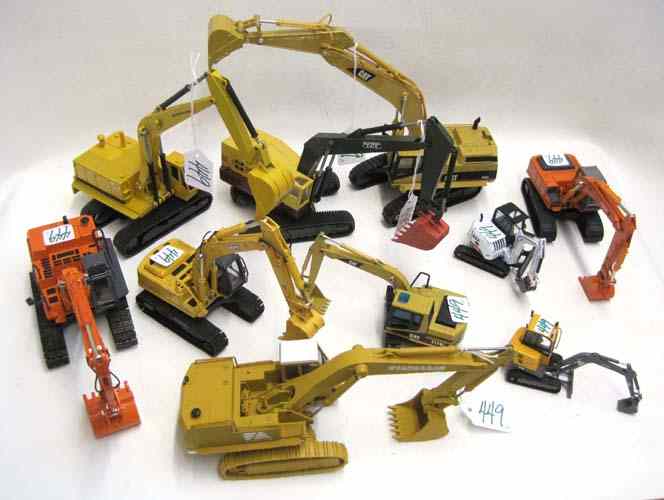 Appraisal: TEN DIECAST METAL SCALE MODEL TRACK LOADERS Hitachi Zaxis LC