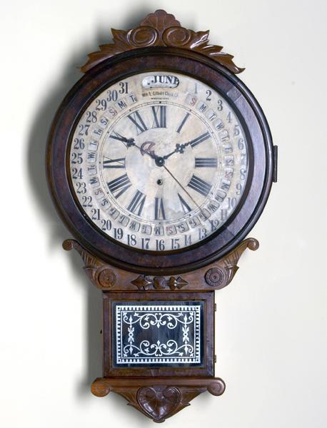 Appraisal: GILBERT CLOCK Spring-driven wall regulator calendar clock