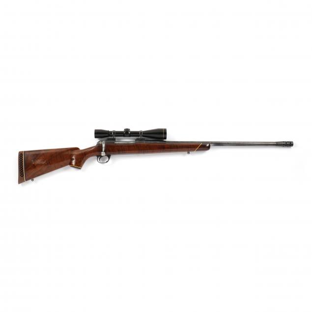 Appraisal: SAINT HUBERT CO WIN MAG RIFLE WITH TASCO SCOPE Serial