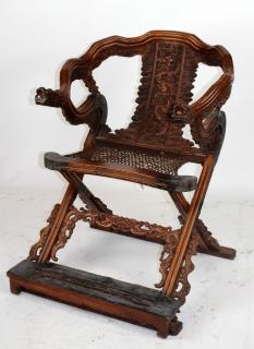 Appraisal: Carved Huanghuali folding horseshoe chair Carved huanghuali folding horseshoe chair