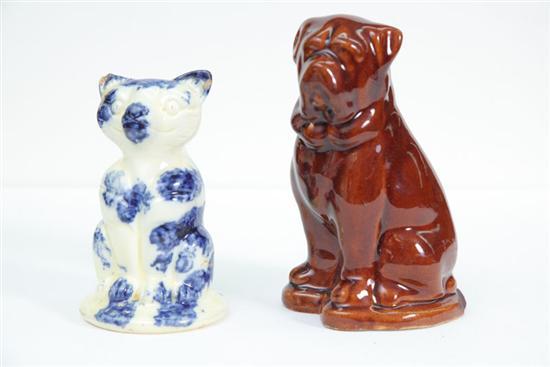 Appraisal: POTTERY DOG AND CAT FIGURES Includes a seated mastiff attributed