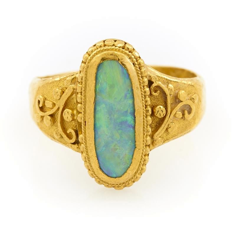 Appraisal: k Yellow gold and opal ring k Yellow gold and