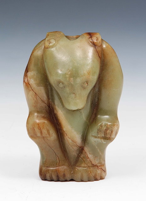 Appraisal: A Chinese carved celadon jade bearprobably Ming dynastystanding with his