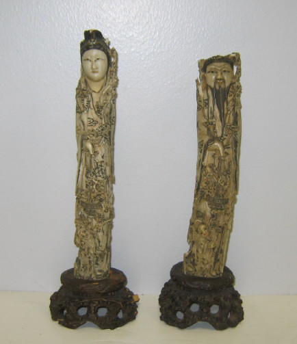 Appraisal: PAIR OF ASIAN ANCESTRAL BONE IVORY FIGURES Detailed figures of