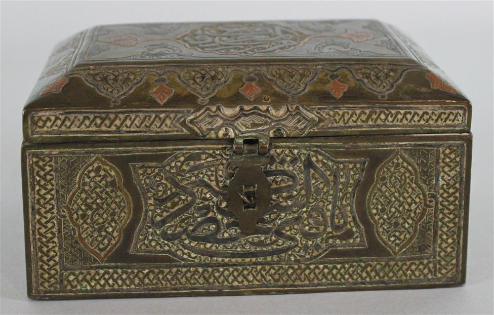 Appraisal: ISLAMIC MIXED METALS RECTANGULAR BOX INLAID WITH CALLIGRAPHIC DECORATION the