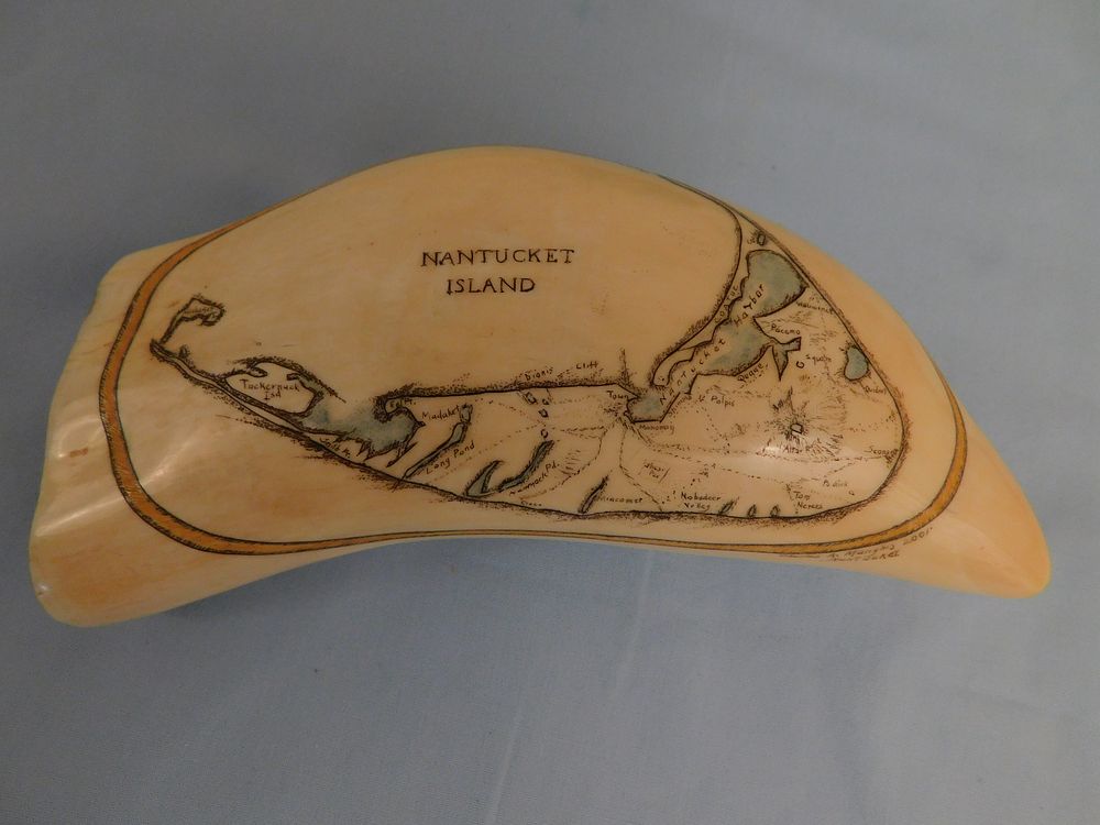 Appraisal: NANTUCKET WHALE TOOTH Large whale tooth with colored scrimshaw map