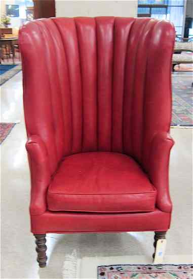 Appraisal: RED LEATHER CHANNEL-BACK ARMCHAIR Continental c having a high curved