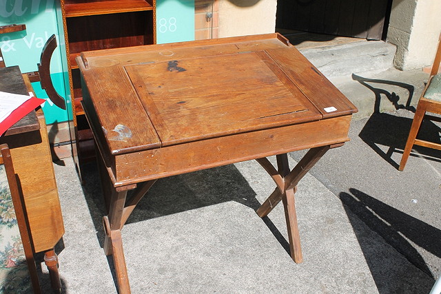 Appraisal: A VICTORIAN PITCH PINE CLERK'S DESK cm across