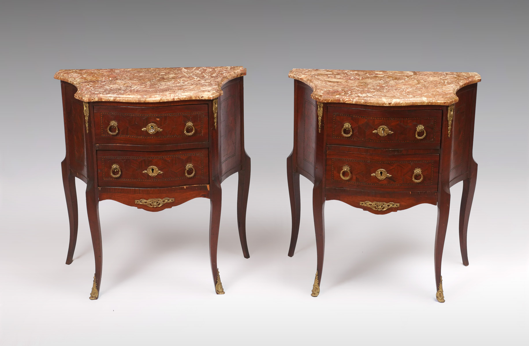 Appraisal: PAIR OF ITALIAN LOUIS XVI STYLE MARBLE TOP CHESTS Pair