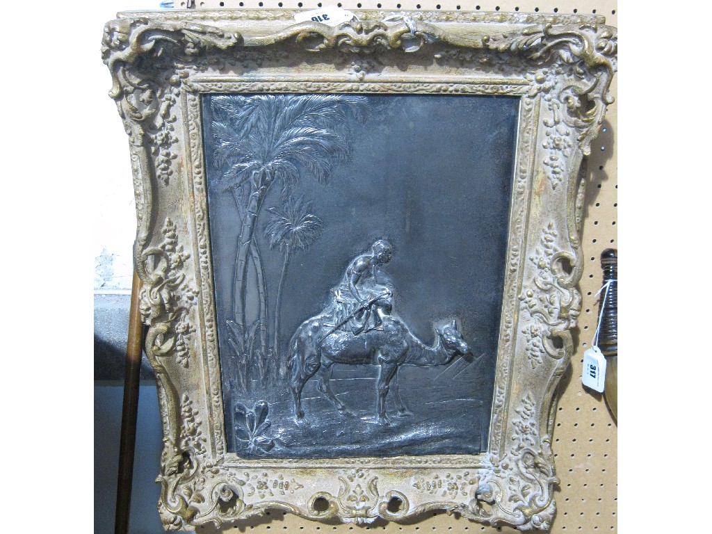 Appraisal: Framed white metal plaque in relief - a man on