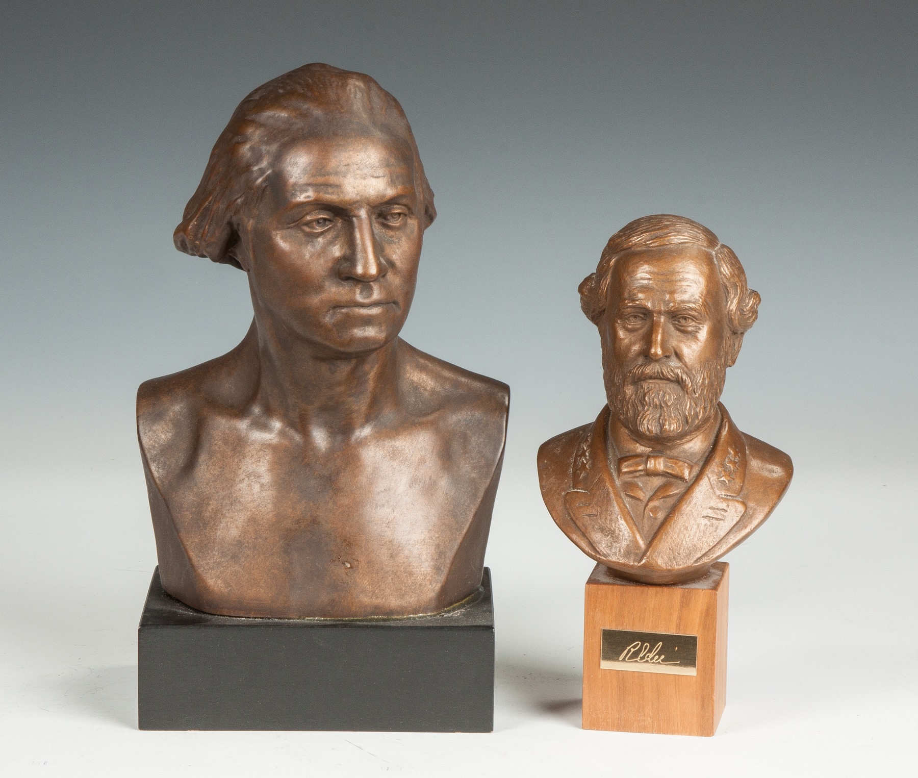 Appraisal: Two Contemporary Composition Busts Composition reproduction bust of Washington modeled