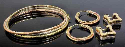 Appraisal: A modern ct three colour gold stiff bangle with matching