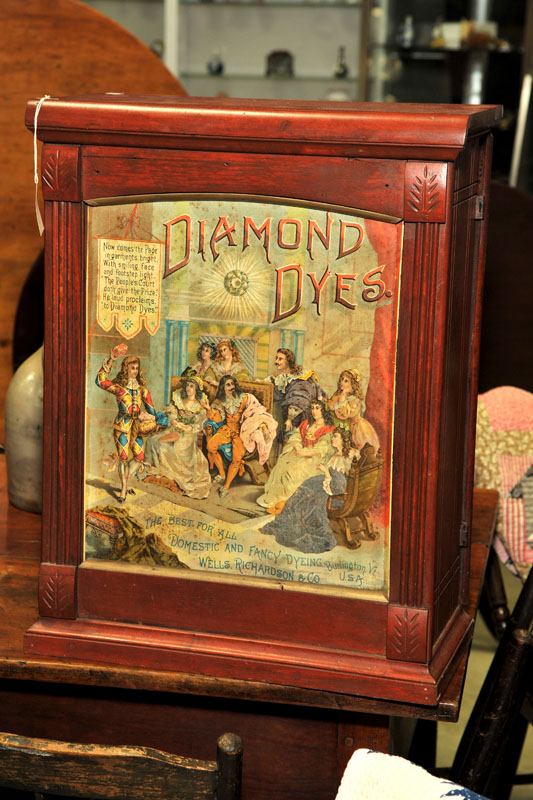 Appraisal: DIAMOND DYE DISPLAY CABINET Hanging double door cabinet with chromolithographed