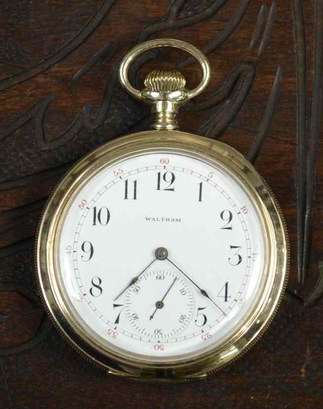 Appraisal: AN AMERICAN FOURTEEN KARAT GOLD OPENFACE POCKET WATCH American Waltham