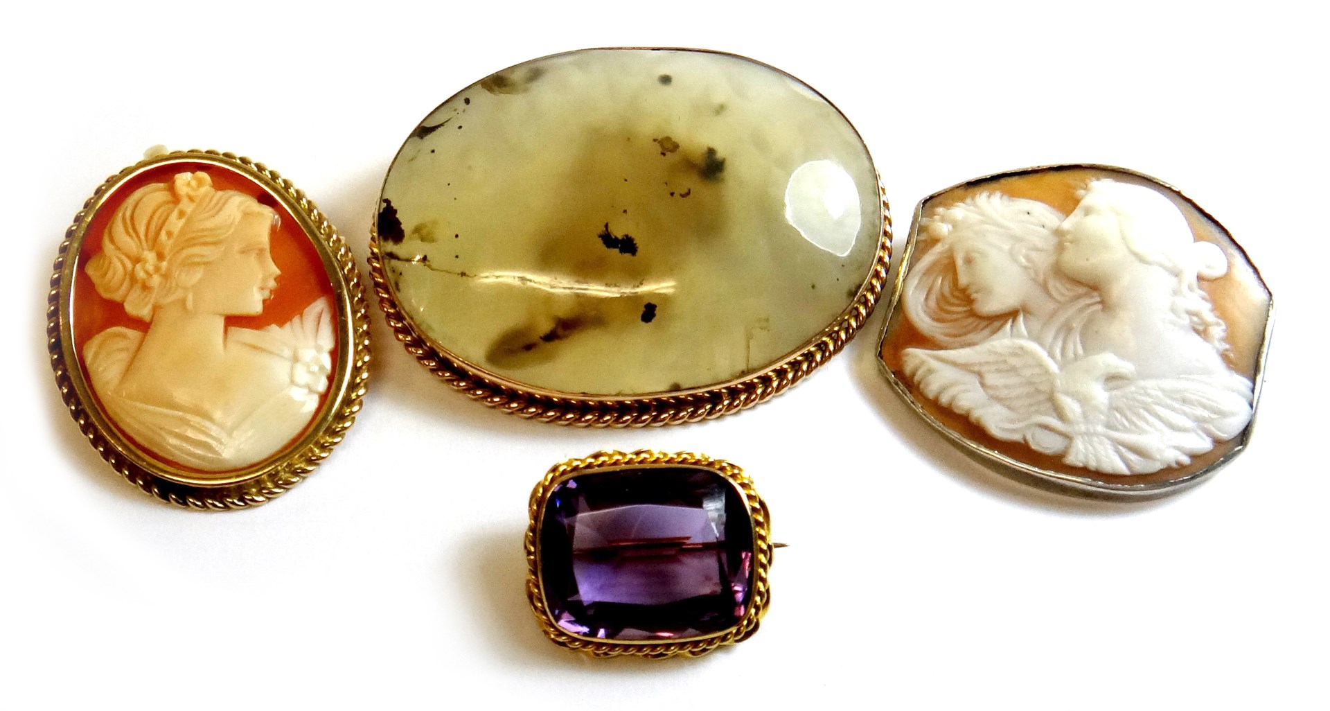 Appraisal: An amethyst set single stone brooch mounted with a cushion