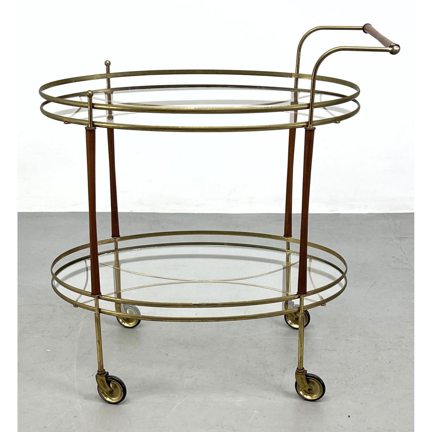 Appraisal: Oval Metal And Glass Rolling Bar Serving Cart Wood trim