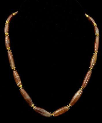 Appraisal: Sumerian Beaded Necklace with Gold Wash Spacers