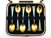 Appraisal: A set of six enamelled silver gilt coffee spoons by