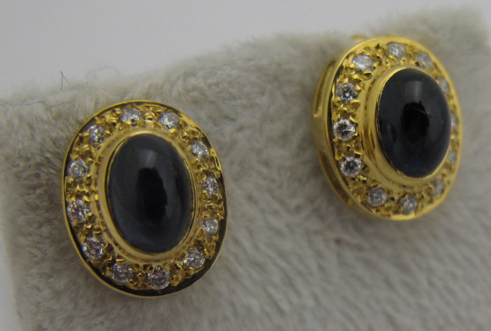 Appraisal: PAIR OF SAPPHIRE AND K GOLD EARRINGS each centering an