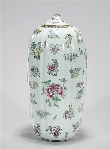 Appraisal: Chinese enameled porcelain covered vase with floral motif x approx