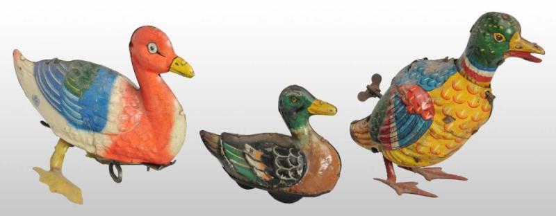 Appraisal: Lot of Tin Litho Duck Wind-Up Friction Toys Description German