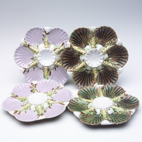 Appraisal: Four Majolica earthenware oyster plates two with pink ground and