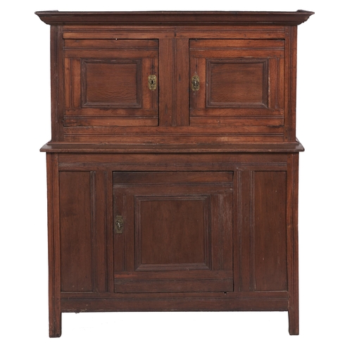 Appraisal: A Charles II oak livery cupboard the ogee cornice above