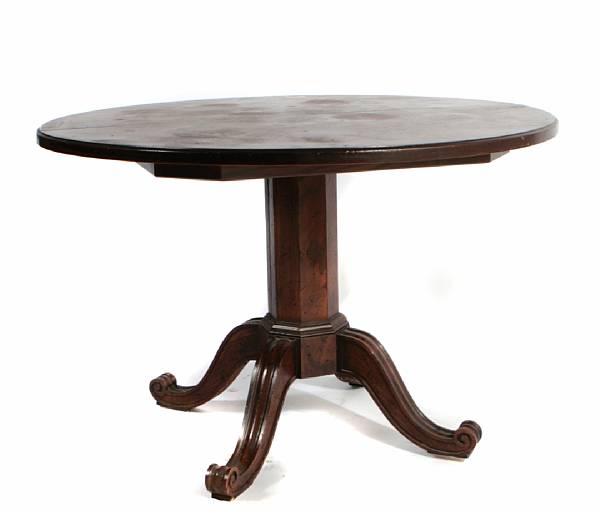 Appraisal: A Regency style oak extension dining table with two leaves