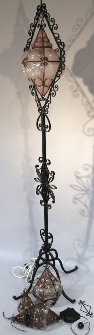 Appraisal: A thC worked metal lamp standard set with various frosted