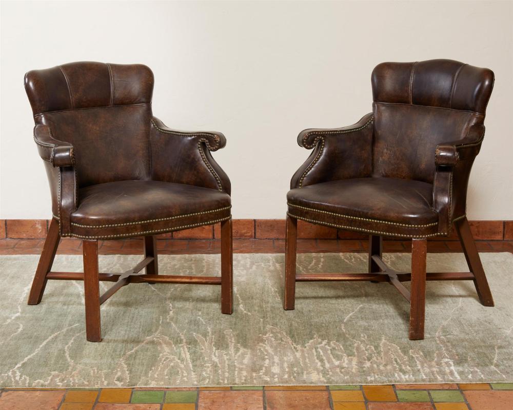 Appraisal: A pair of leather banker's chairs th Century With Texas