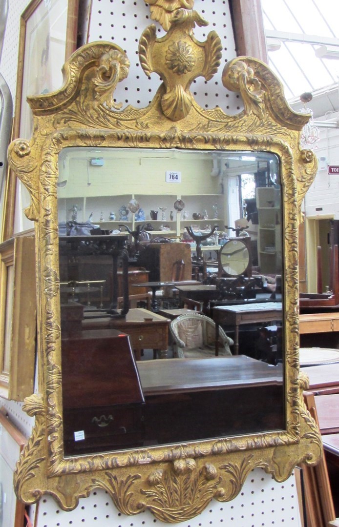 Appraisal: An th century gilt framed wall mirror the broken swan