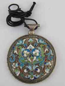 Appraisal: A white metal tests silver cloisonne enamelled circular pendant in