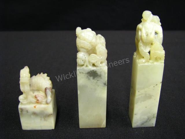 Appraisal: Group of Three Oriental Carved Stone Seals depicting Foo Dog