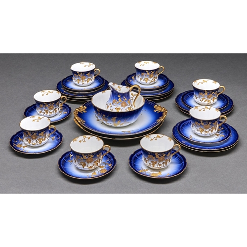 Appraisal: A Limoges tea service c with raised gilt foliage on