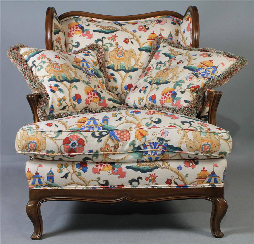 Appraisal: FRENCH PROVINICAL STYLE WING CHAIR WITH FRUITWOOD TRIM AND FLORAL