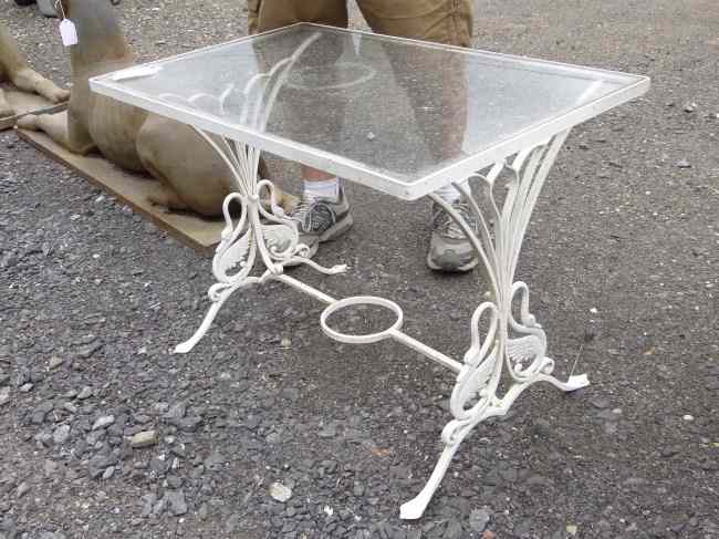 Appraisal: Glass top patio table with goose design Top '' x