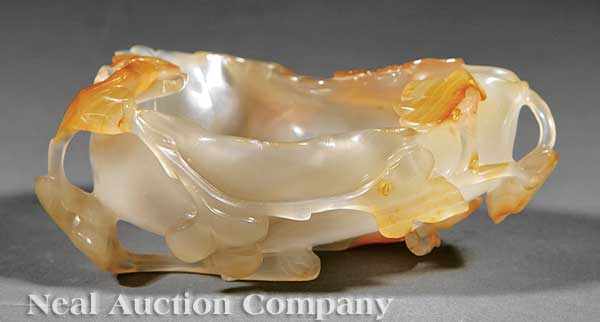 Appraisal: A Chinese Carved Agate Leaf-Form Water Coup carved with allover