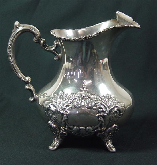 Appraisal: Poole Sterling Water Pitcher Hand chased Crest of Windsor Four