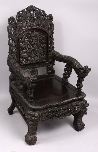 Appraisal: th Century heavily carved Chinese armchair possibly Imperial h x