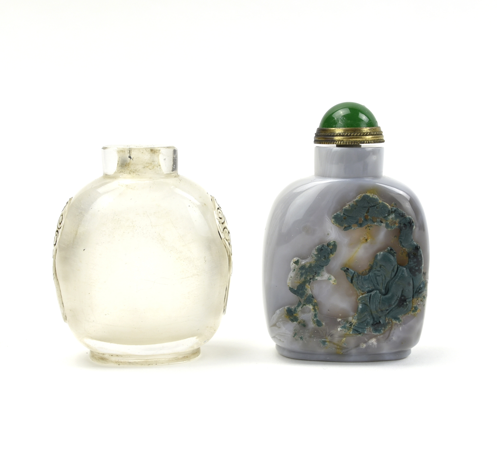 Appraisal: Chinese a translucent glass snuff bottle with two facial mask