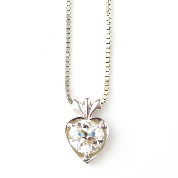 Appraisal: A transitional-cut diamond and white gold pendant with chain estimated