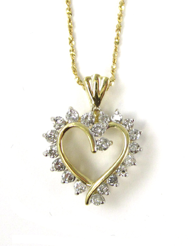 Appraisal: DIAMOND AND FOURTEEN KARAT GOLD PENDANT NECKLACE with PGL appraisal